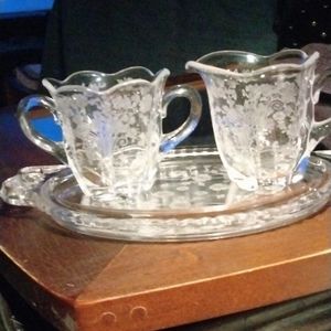 Antique etched creamer pitcher & sugar bowl on matching tray.